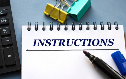 Instructions,Word,Is,Written,In,A,Notebook,With,A,Marker,
